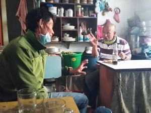 Karna Tamang in Kathmandu tells a friend about bringing his group down from Everest Base Camp after the avalanche.
